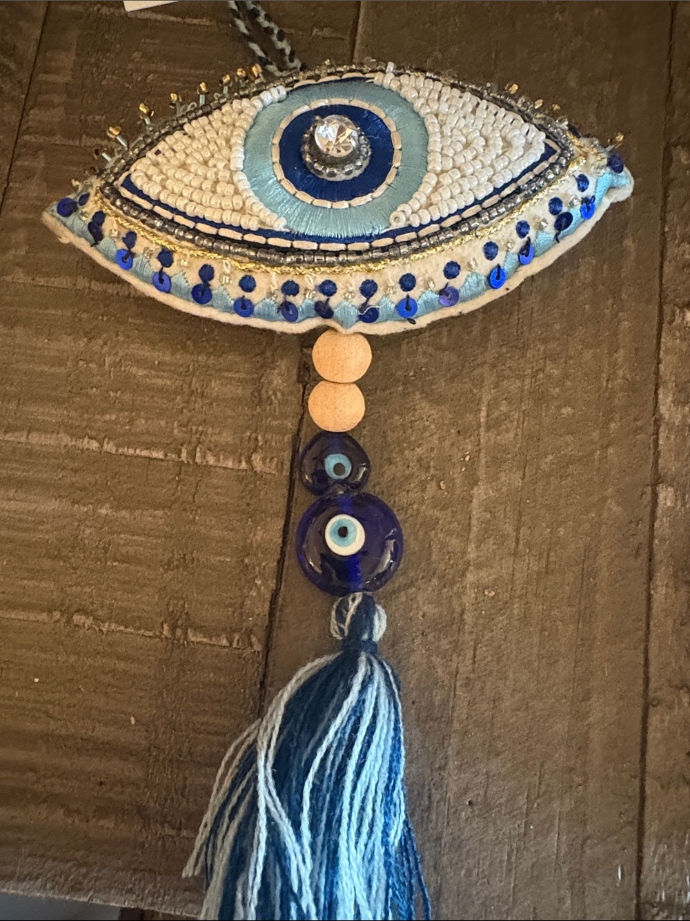 Cost Plus World Market Blue and White Evil Eye Tassel Wall Decor